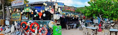 Purchase large format photos on canvas of Virgin Islands beach bars, such as One Love, Jost van Dyke (item-2847), from renowned fine art photographer Steve Vaughn.